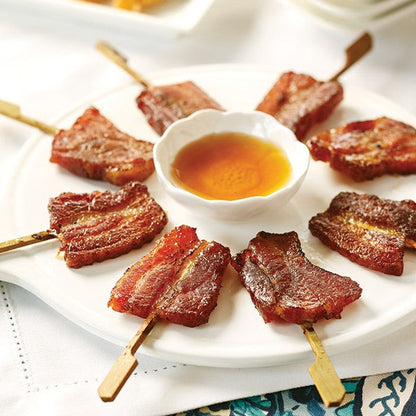 Bacon Lollipops on skewers served Vanilla-Bourbon Glaze