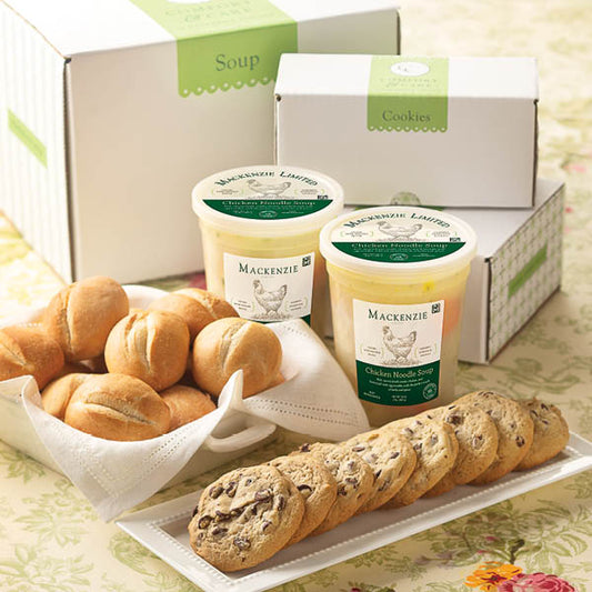 Chicken Noodle Soup Care Package, featuring two 32 oz. Chicken Noodle Soups, 12 dinner rolls, and 8 chocolate chip cookies