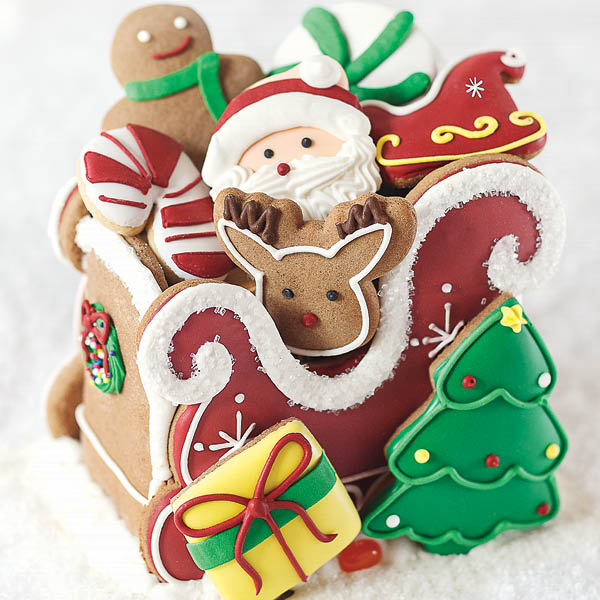 Holiday decorated gingerbread sleigh, filled with six 2" Christmas decorated gingerbread cookies