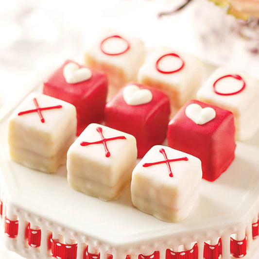 Valentine Petit Fours, hand-decorated with hearts, X's, and O's